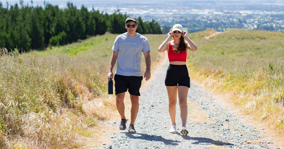 Walking path through a green park in Christchurch